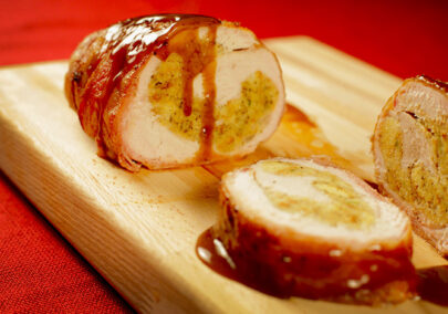 bacon wrapped smoked turkey breast stuffed with jalapeno cornbread dressing