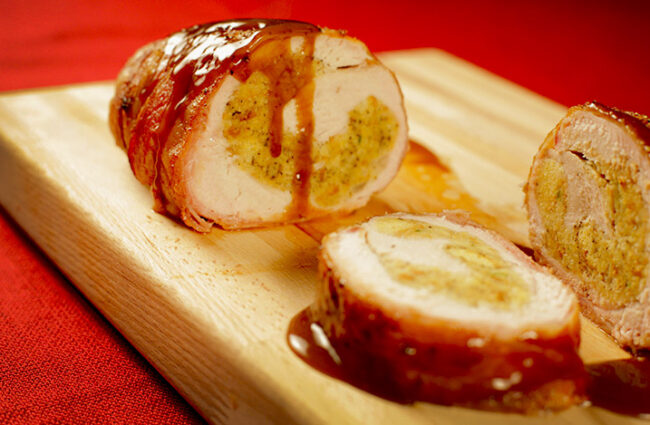 bacon wrapped smoked turkey breast stuffed with jalapeno cornbread dressing